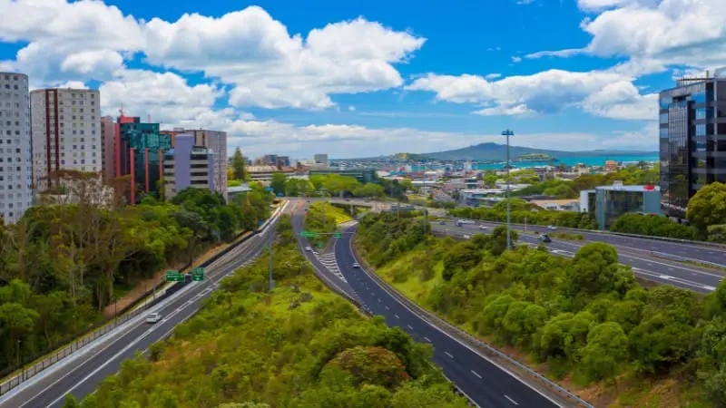Auckland cityscape with highways and green spaces - free urban views.