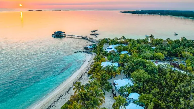 Small Hope Bay Lodge features beachfront cottages and activities perfect for families.