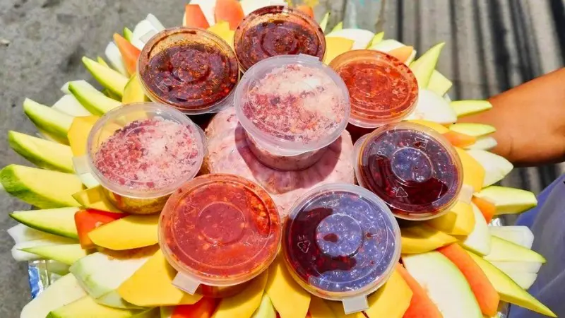 Green mangoes with shrimp paste, a classic Cebu treat.