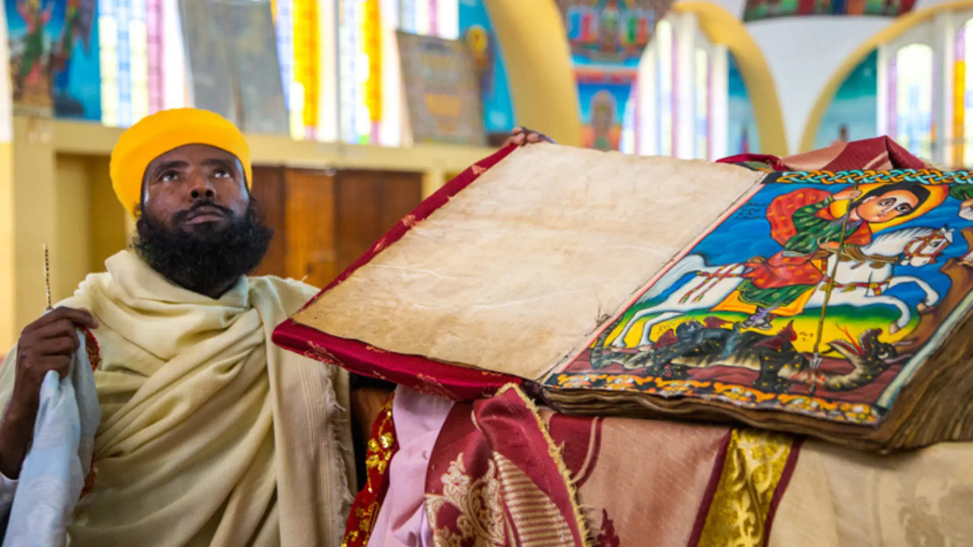 Image of Aksum local next to book