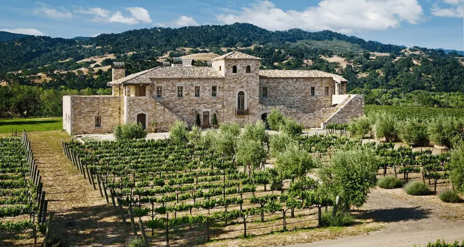 Image of old building surrounded by vineyards