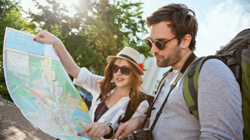 Tourists study a map and plan their itinerary for exploring things to do in Nicosia.