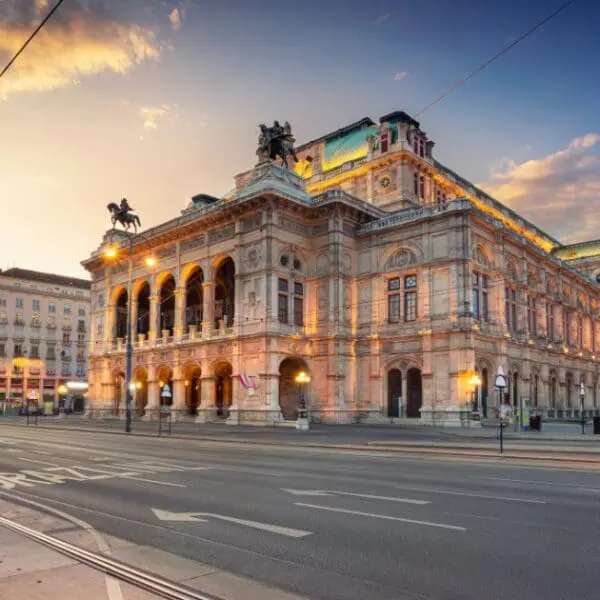 Vienna State Opera House illuminated at sunset, a highlight in a Vienna itinerary for first-time visitors.