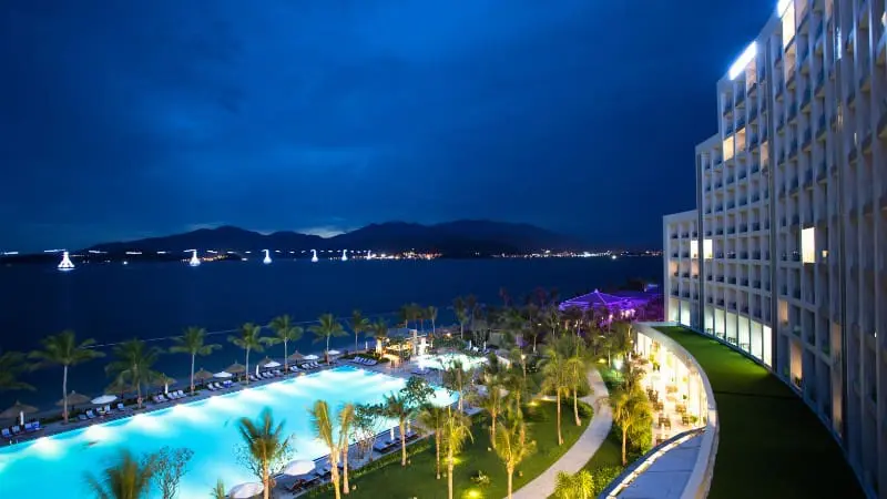 Luxury resort in Australia or New Zealand with stunning coastal view at night.