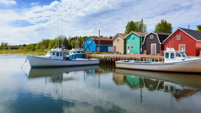 Colorful fishing village charms tourists in Prince Edward Island.