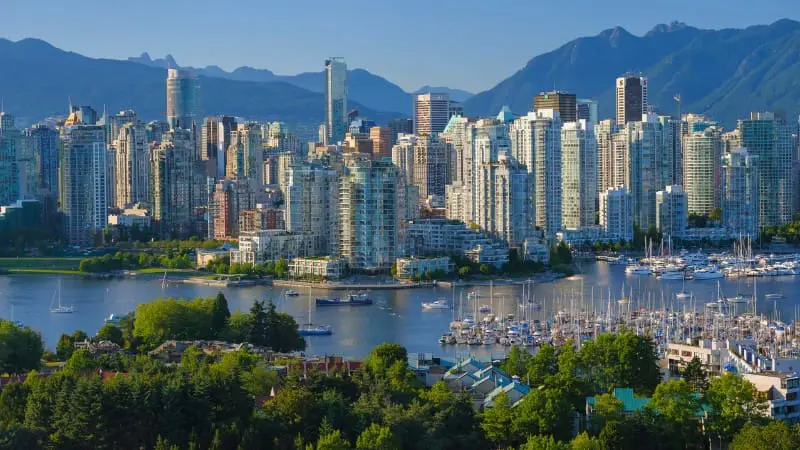 Vancouver's cityscape and harbor highlight its appeal as a top Canadian destination.