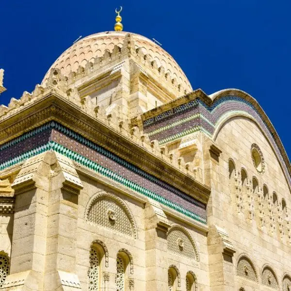 An ornate mosque in Casbah Algiers, showcasing intricate designs and historical depth.