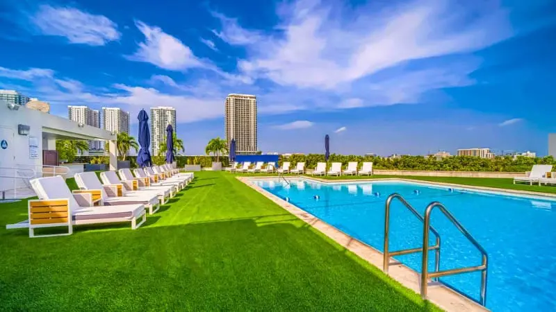 Hilton Miami Downtown showing poolside area, short shuttle ride to Cruise Port.