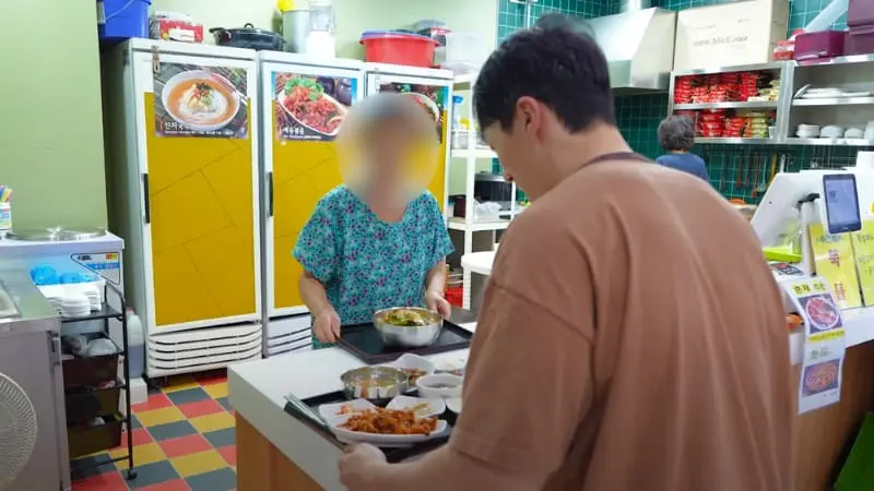 Busy food and snack area within the facility, offering local treats.