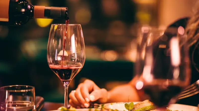 Enjoying a glass of wine at one of the top dining spots in Seminyak.