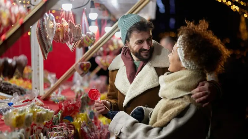 Couple exploring a candy stand during the Berlin Sweet On You event in Berlin, Ohio.