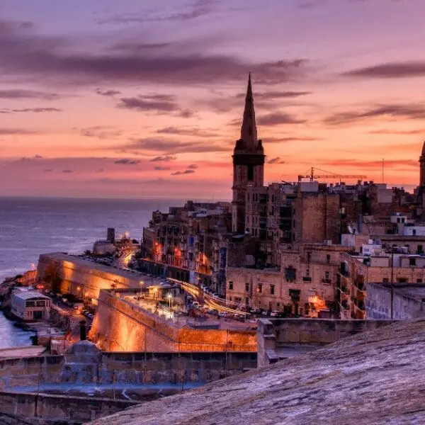Enjoy sunsets over the historic buildings, one of the best things to do in Valletta.