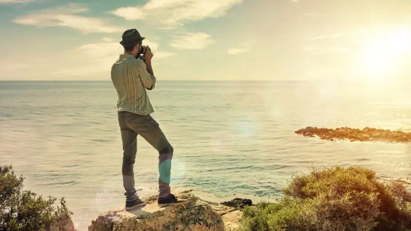 Photographer capturing sunset views along the Oregon Coast.