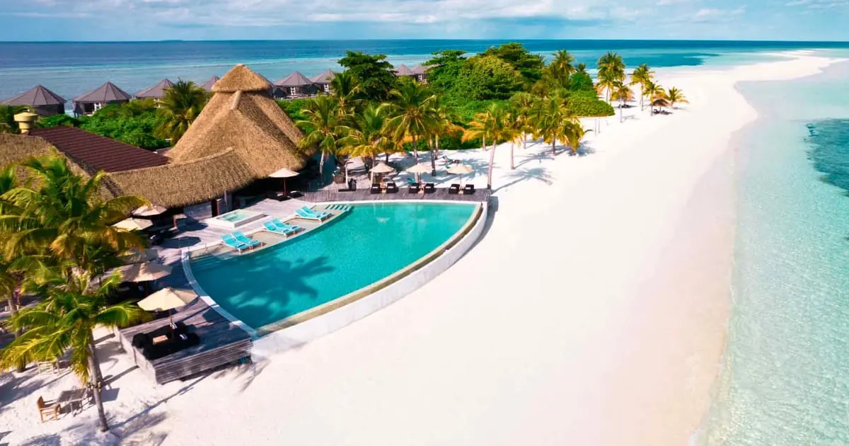 Kuredu Island Resort & Spa, perfect for adventure seekers with its beachside view.