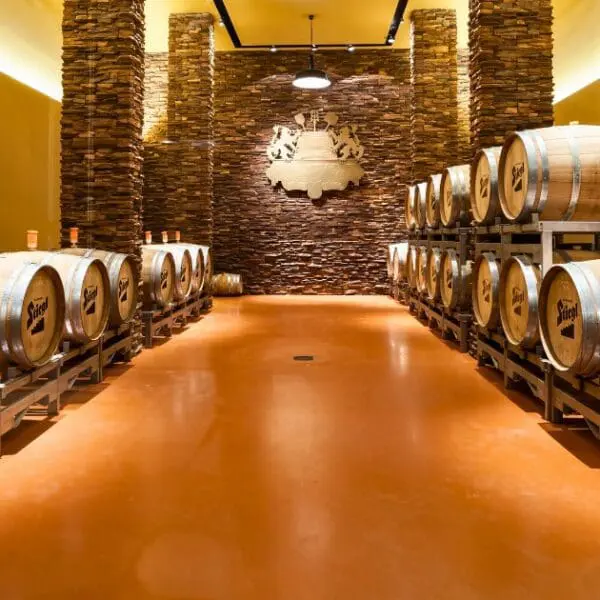 Barrel room at Milwaukee Breweries, showing aging barrels for unique beers.