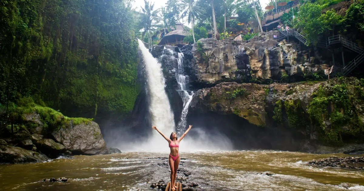 Respect the local culture while visiting the beautiful Tegenungan Waterfall.