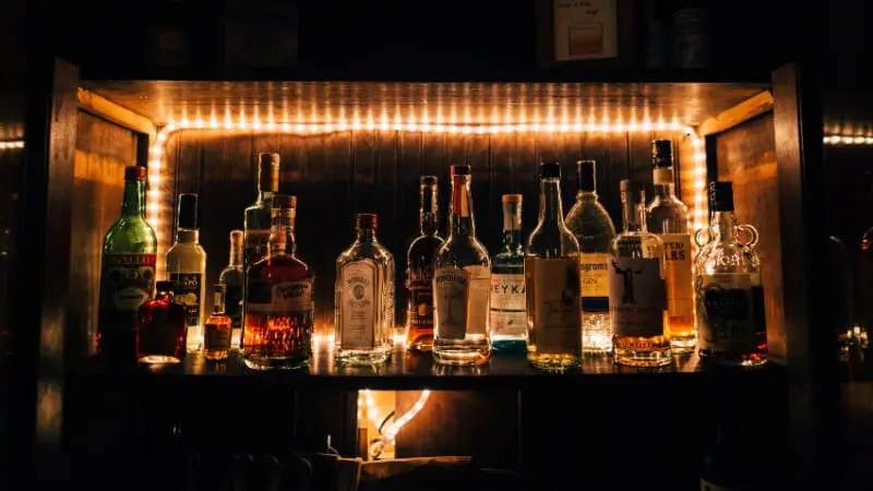 Sample local rum at a cozy bar in Bridgetown's historic district.