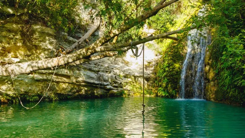 Swim in the emerald green waters of Adonis Baths Waterfalls in Cyprus.