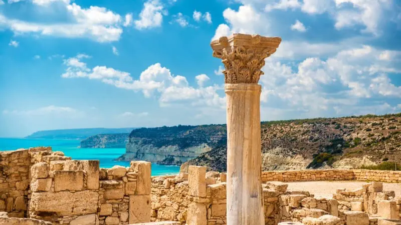 Ancient Kourion ruins with columns, a popular archaeological site in Cyprus.