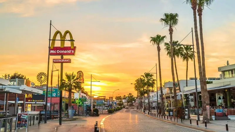 Explore the vibrant streets of Nissi Avenue in Ayia Napa, Cyprus.