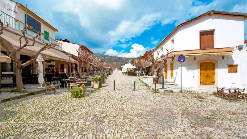 Stroll through the cobblestone streets of Omodos Village in Cyprus.