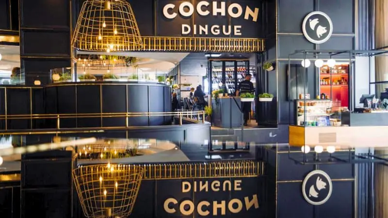Inside Cochon Dingue, a fun and quirky restaurant.