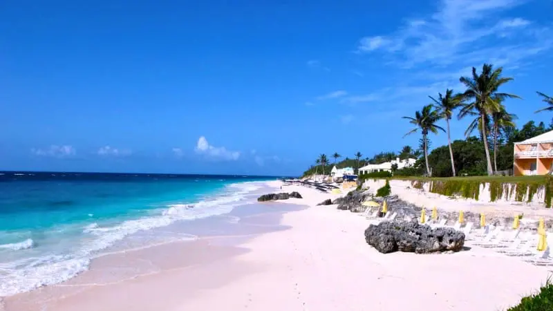 Elbow Beach’s pink sand is a Bermuda highlight for swimming and sunbathing.