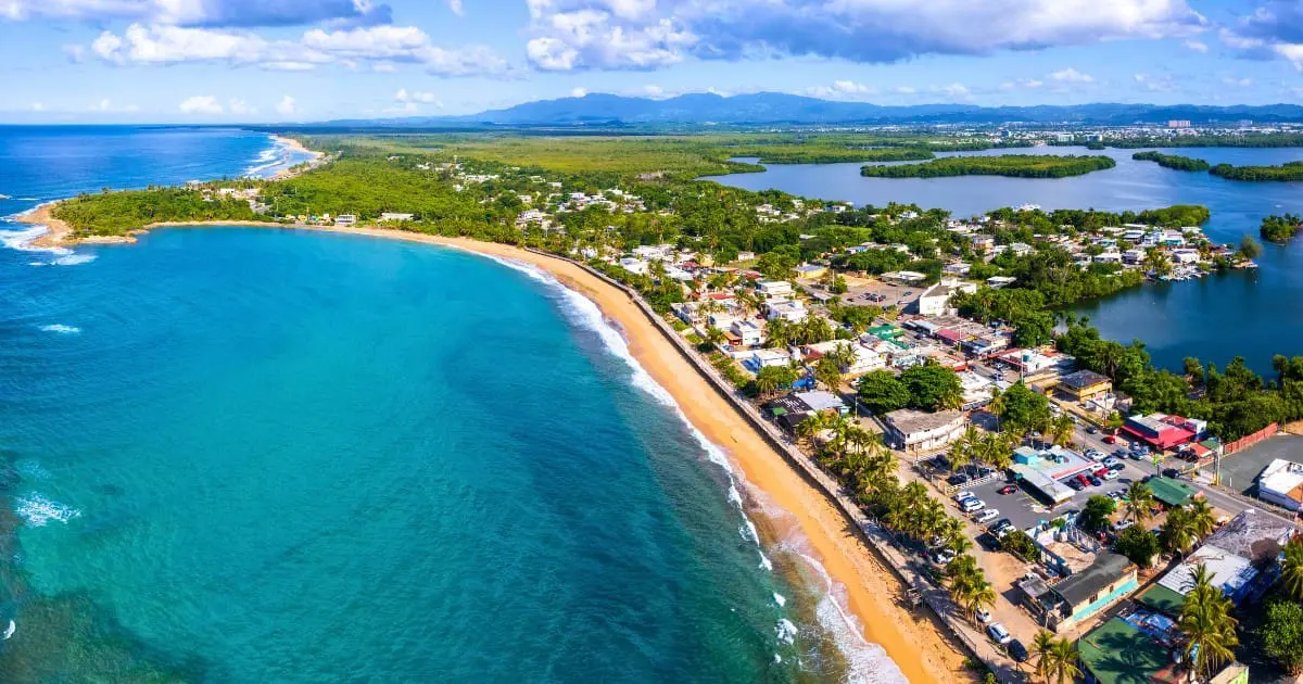 Aerial view of a beach, a beautiful spot in any Puerto Rico itinerary for 2024.