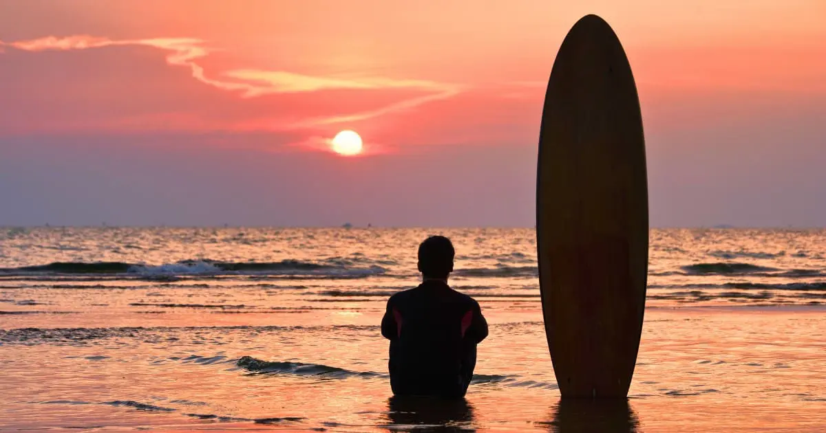 Watching the sunset after a day of surfing in Thailand is the perfect way to unwind.