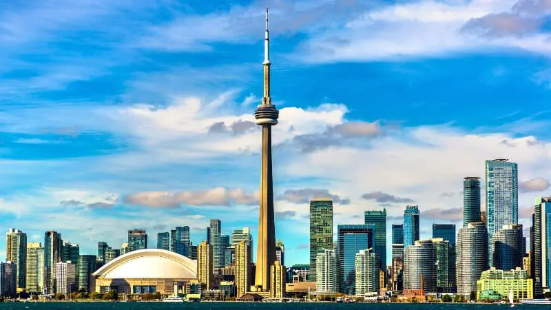 Visit the CN Tower in Toronto with kids for stunning views and thrilling experiences.