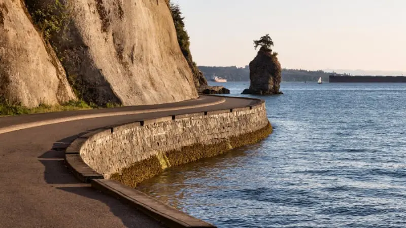 Bike the Stanley Park Seawall Loop for stunning coastal views in Vancouver.
