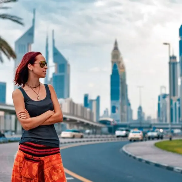 Traveling to Dubai as a woman, respecting local dress codes while exploring.