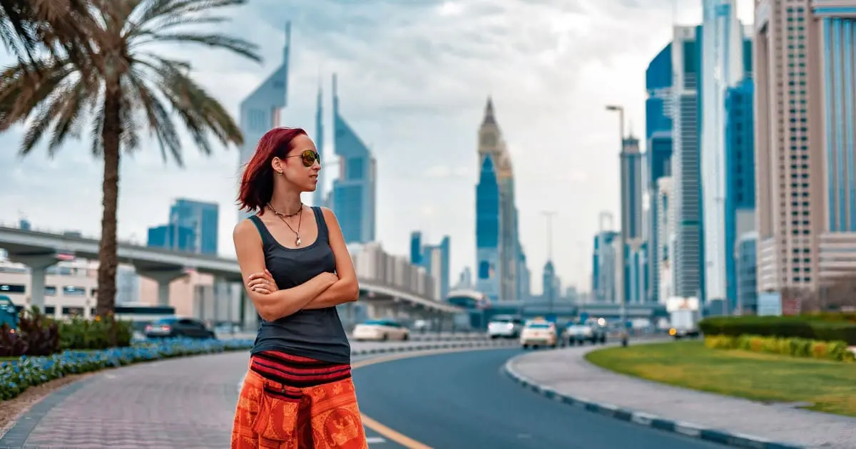Traveling to Dubai as a woman, respecting local dress codes while exploring.