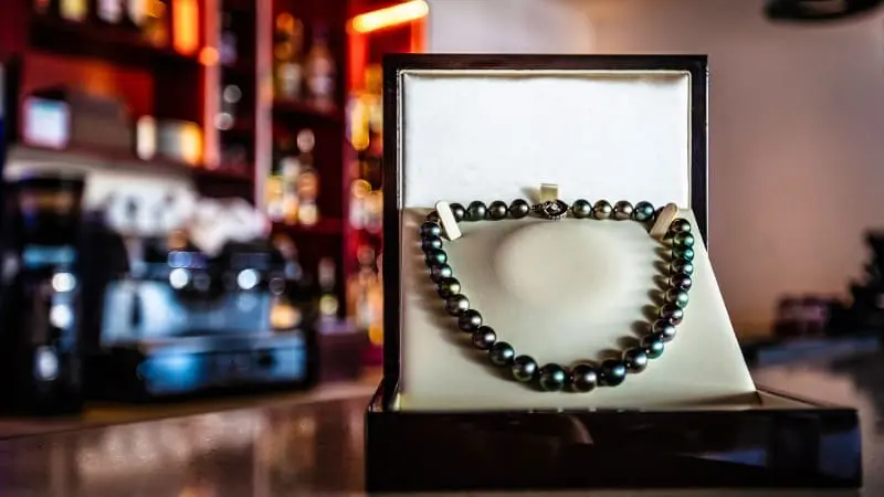 Papeete is known for its beautiful black pearls displayed in shops.