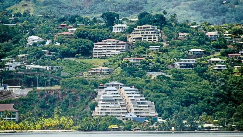 Hills around Papeete feature scenic homes with lush green views.