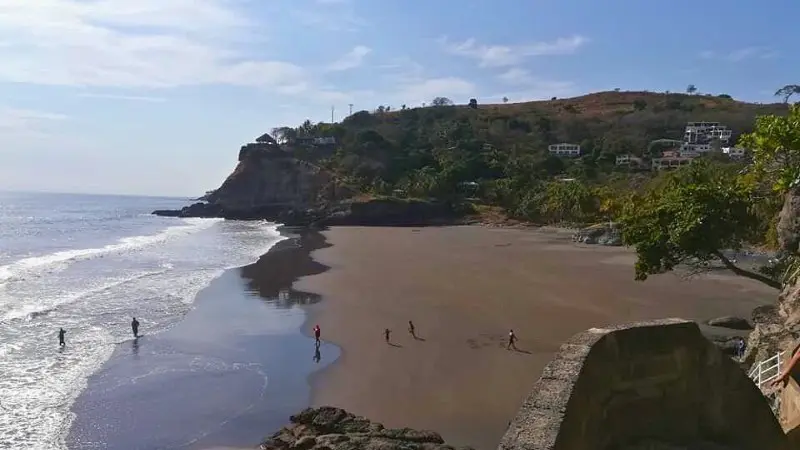 Playa El Sunzal, known for smooth surf and relaxed vibes.