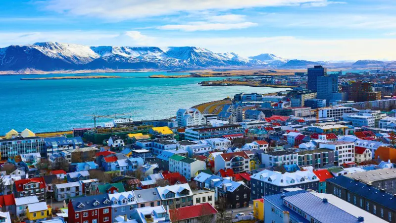 Colorful city view of Reykjavik with mountains, near Skarfabakki Harbour.
