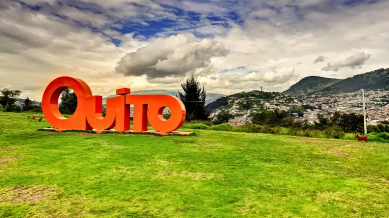 Quito sign with mountain views, a perfect photo spot in Ecuador’s capital.