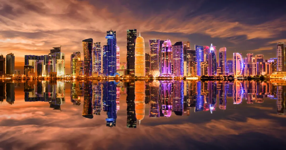 Doha's skyline features modern skyscrapers with vibrant lighting and unique designs.