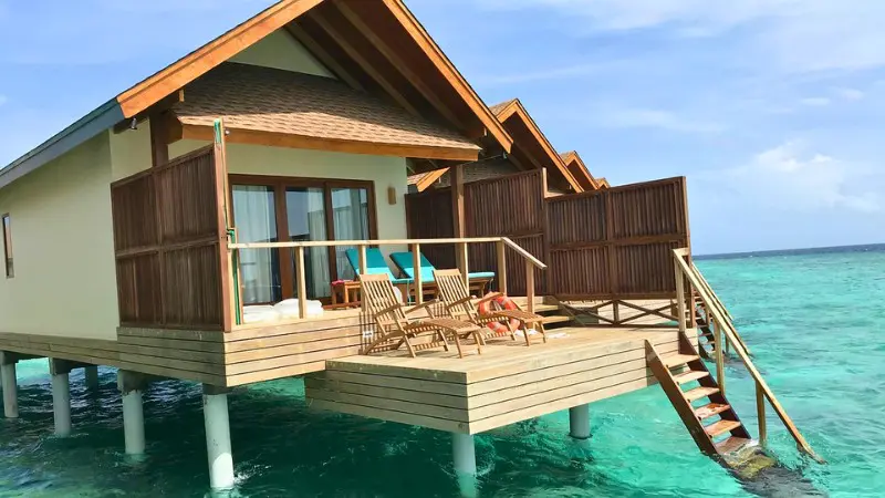 Affordable water villas in Male Maldives with ocean views at Reethi Faru Resort.