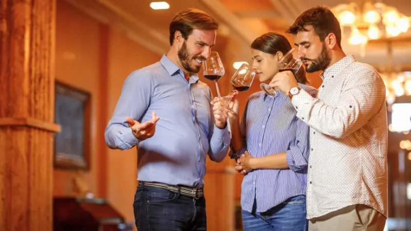Group sampling wines during a half-day wine tasting tour in Adelaide Hills.