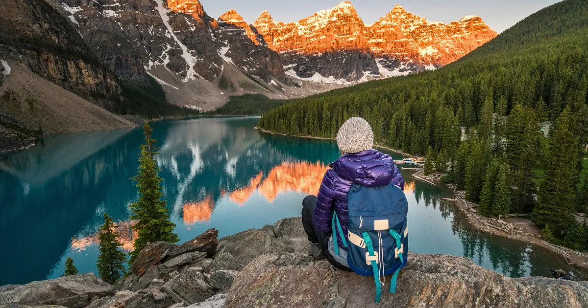 A scenic sunrise at Banff’s Moraine Lake, perfect for a hiking adventure.