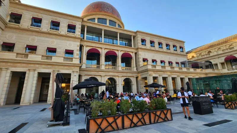 Plan your shopping day at 21 High Street's outdoor dining terrace in Doha.