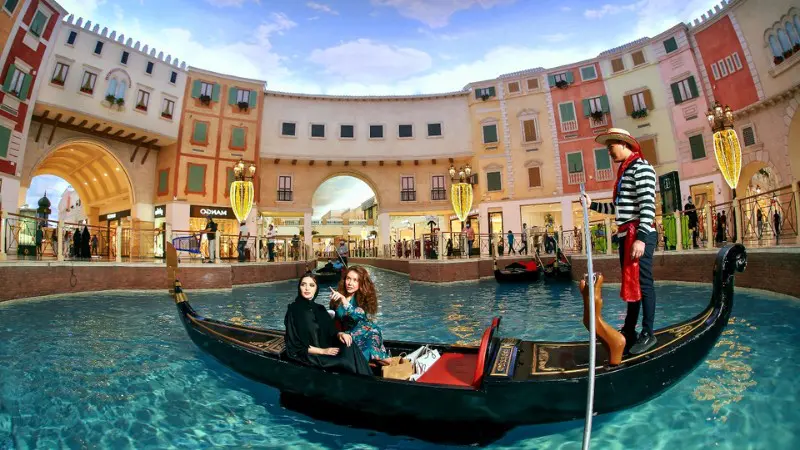 Take a gondola ride while shopping at Villaggio Mall in Doha.