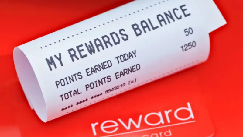 Credit card reward points statement showing earned travel miles.