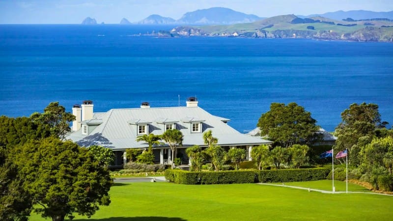 Kauri Cliffs, a top luxury lodge in New Zealand, set in a picturesque oceanfront location.