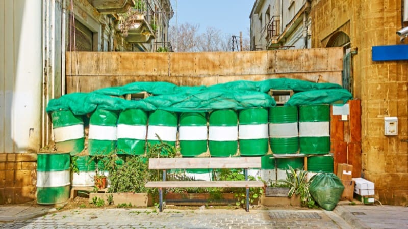 Barriers mark the historic Green Line, a significant landmark to explore in Nicosia.