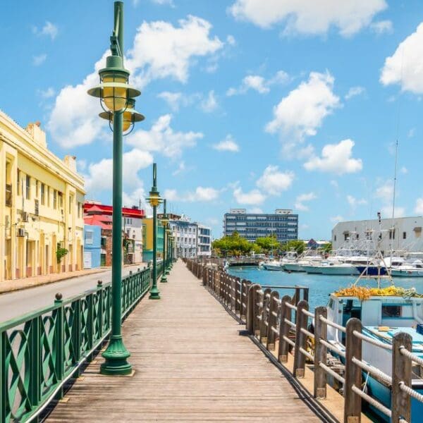 Colorful, picturesque waterfront of Barbados, perfect destination for travelers traveling Barbados on a budget.