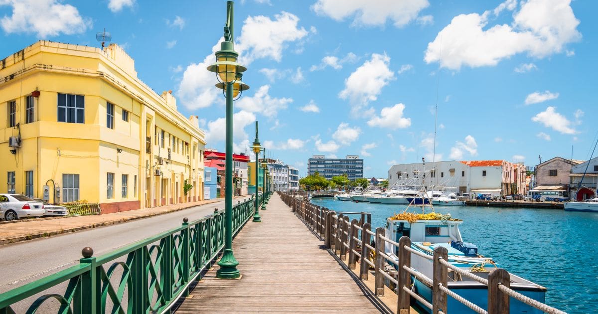 Colorful, picturesque waterfront of Barbados, perfect destination for travelers traveling Barbados on a budget.
