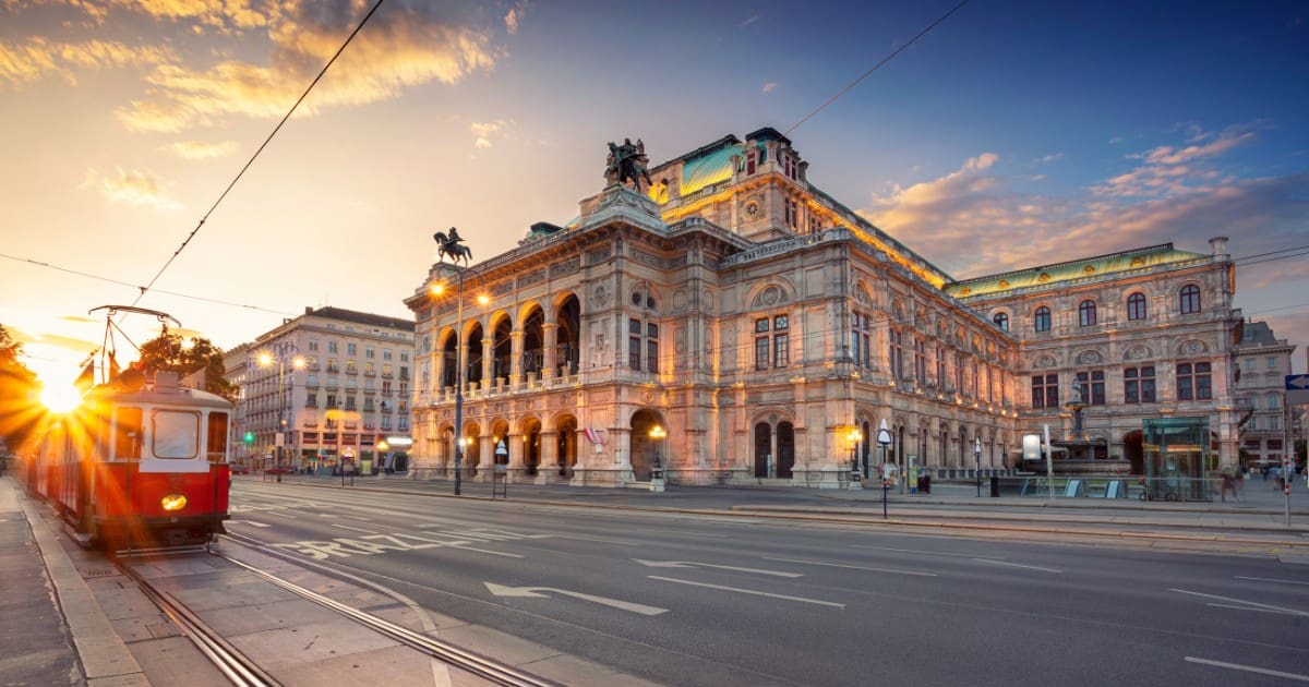 Vienna State Opera House illuminated at sunset, a highlight in a Vienna itinerary for first-time visitors.